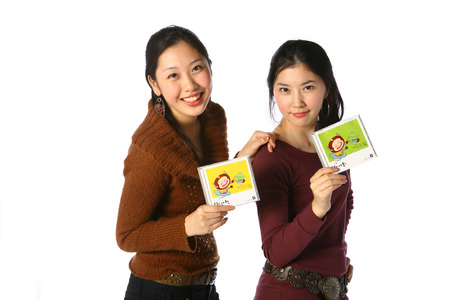 Two asian woman in studio - isolated on white