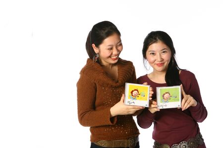 Two asian woman in studio - isolated on white