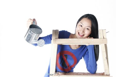 Asian woman in studio - isolated on whiteの写真素材