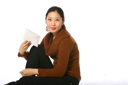 Asian woman in studio - isolated on whiteの写真素材