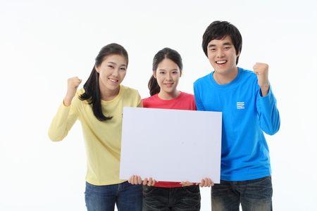 Young college students in studio - isolated on whiteのeditorial素材