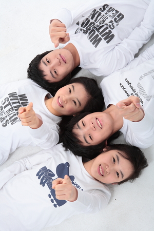 Young college students in studio - isolated on whiteの写真素材