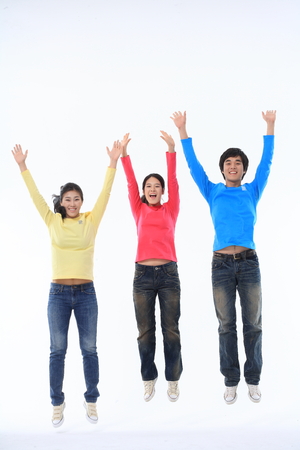 Young college students in studio - isolated on whiteのeditorial素材