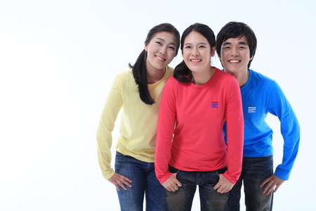 Young college students in studio - isolated on whiteのeditorial素材
