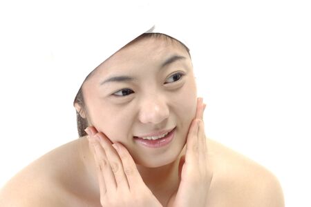 Beauty Concept - Close up shot of Asian woman's fresh skin, isolated on whiteの写真素材