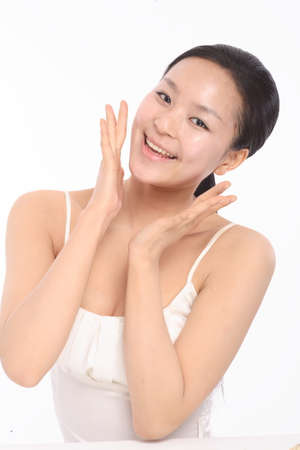 Beauty Concept - Beautiful Asian woman with perfect skin, isolated on whiteの写真素材