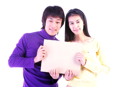 Young people with props in the studio,isolated on white.の写真素材