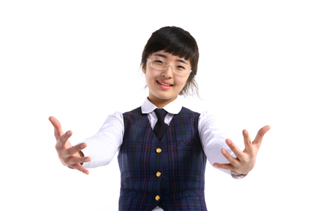 A high school girl in the studio,isolated on white.の写真素材