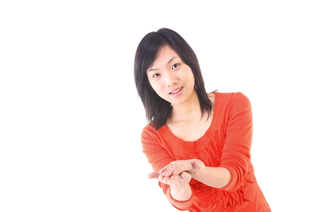 A girl in the studio,isolated on white.の写真素材