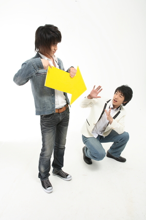 Boys in the studio,isolated on white.の写真素材