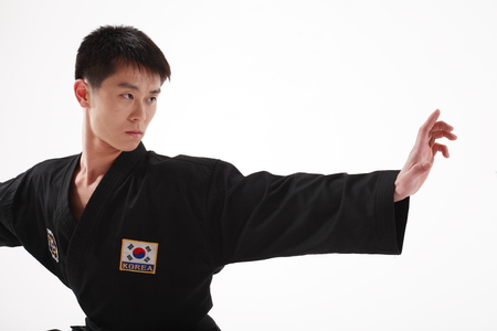 Asian martial arts master - isolated on whiteの写真素材