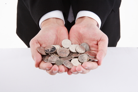 Man holding handful of moneyの写真素材