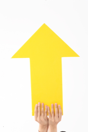 Hands holding a signの写真素材