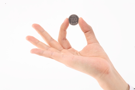 Close-up shot of a hand holding money