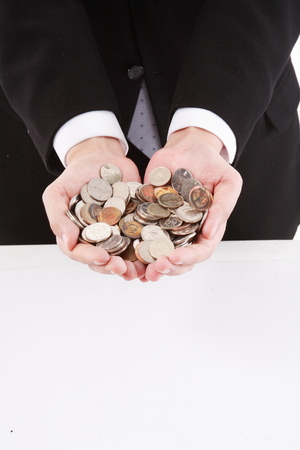 Man holding handful of moneyの写真素材