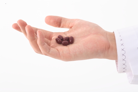 Close-up shot of pills on a handの写真素材