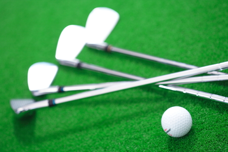 Close-up shot of golf balls and golf clubsのeditorial素材