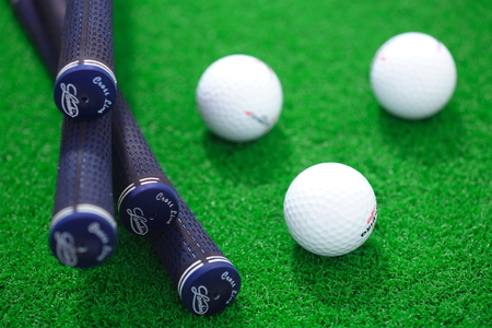Close-up shot of golf balls and golf clubsのeditorial素材