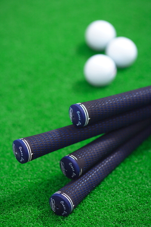 Close-up shot of golf balls and golf clubsのeditorial素材