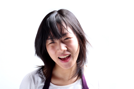 Close up shot of a woman in twenties banging headの写真素材