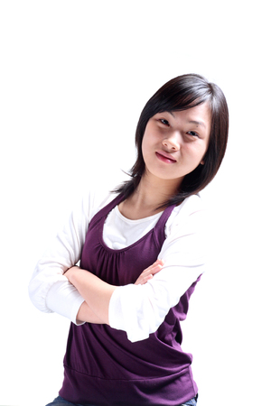 Torso shot of a young woman with arms crossedの写真素材