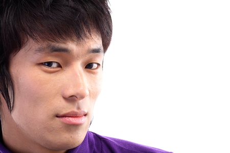 Close up shot of a man's face in twentiesの写真素材
