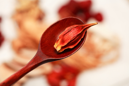 Close up shot of a spoon of ingredients of korean traditional medicineの写真素材