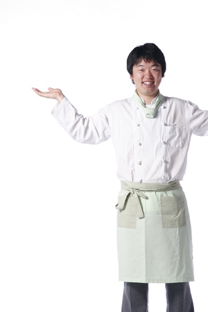 A male cook showing empty handsの写真素材