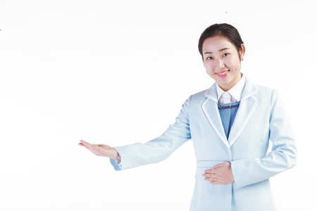 Close up shot of A female hospital coordinator showing an empty hand to the side wayの写真素材