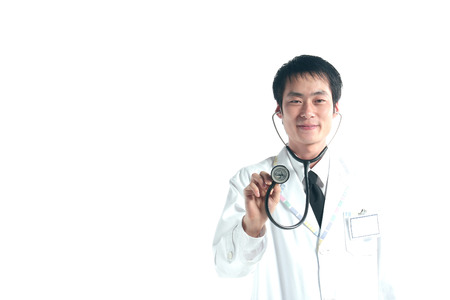 Close up shot of A male doctor applying the stethoscope in the air as demonstrationの写真素材