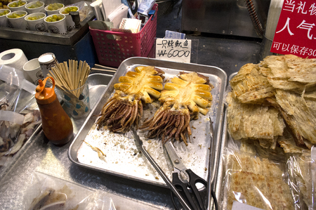Street food - Various seafood/grilled squidsの写真素材