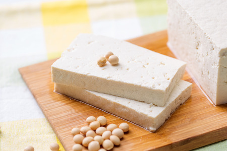 Slow food - Bean curd/tofu with brown beans shot in studioの写真素材