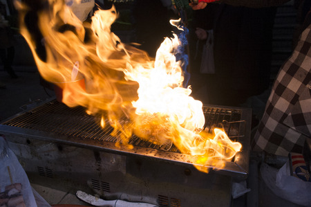 Street food - Fire flame from grillの写真素材
