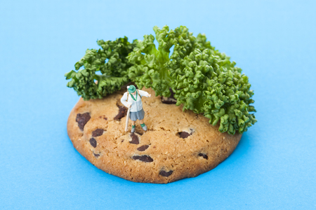Creative miniature life - Man traveling/exploring in an islandの写真素材