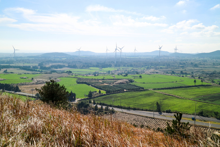 Landscape of Jeju Island with wind power plants Landscape of Jeju Island with wind power plants