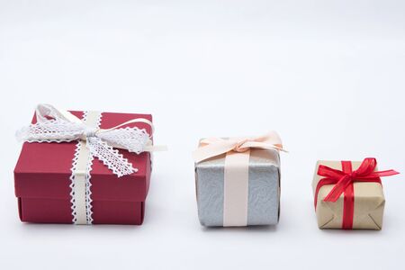 Gift box isolated shot in studio - Various sizes of gift boxes with colorful ribbonsの写真素材