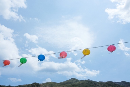 Buddhist temple in Korea - Round shape colorful lanterns and blue skyの写真素材