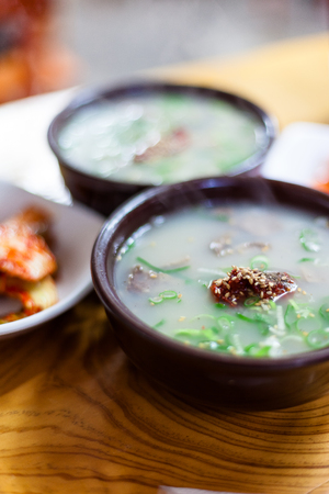 Korean traditional market - pork soup served with kimchの写真素材