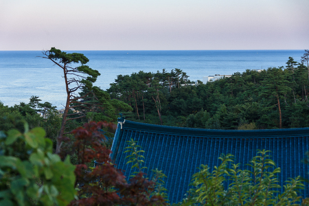 Naksan Temple - beautiful scenery of ocean looking over the roofの写真素材