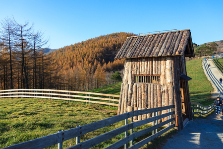 Fenced ranch and a shed along the unpaved roadのeditorial素材