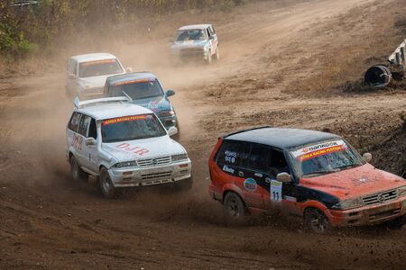 SUV cars drifting on the dirt road to as competitingのeditorial素材