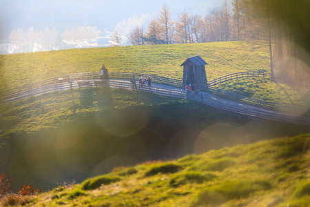 Scenery of fenced ranch with a shed at sunsetのeditorial素材