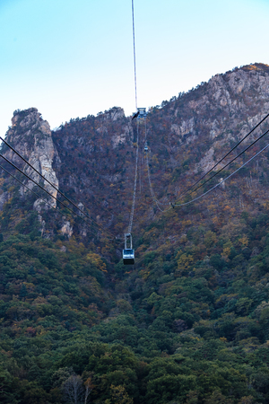 Mt. Seorak in Autumn - cable cars connecting peaksの写真素材