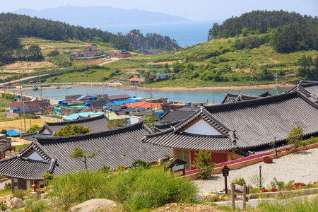 Slow city island-Aerial scenery of tile roof houses in the villageのeditorial素材