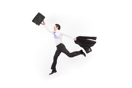 Asian businessman jumping - isolated on whiteの写真素材