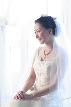 Close up Asian young bride with smileの写真素材