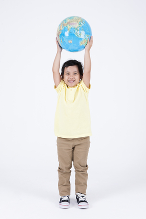 Asian multicultural family daughter with globe isolated on whiteの写真素材