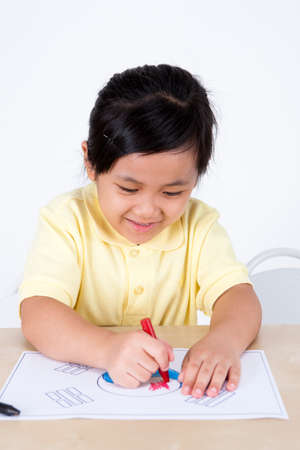 Multicultural family daughter drawing Korean flag isolated on white
