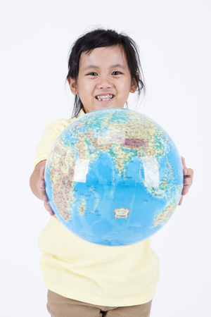 Multicultural family daughter with globe isolated on whiteの写真素材