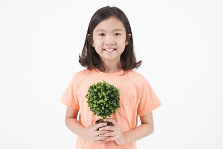 Asian female child with planter isolated on white